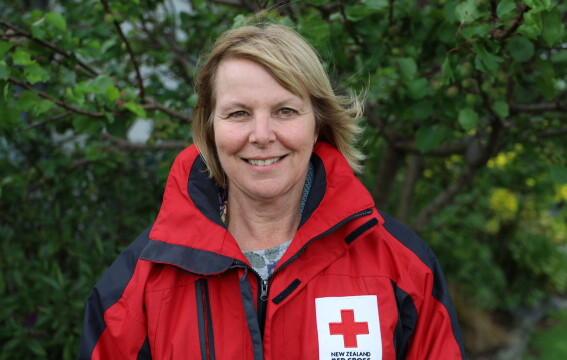 A nurse smiling at the camera.