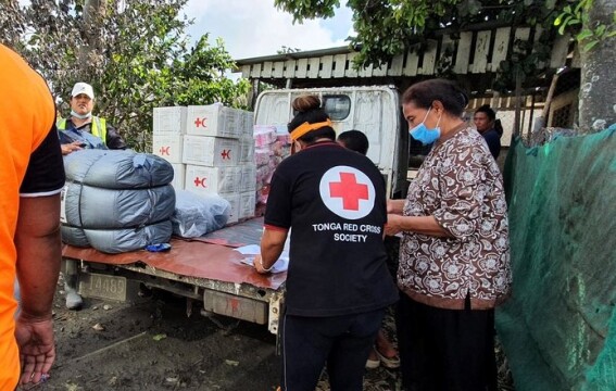 People unloading aid supplies.