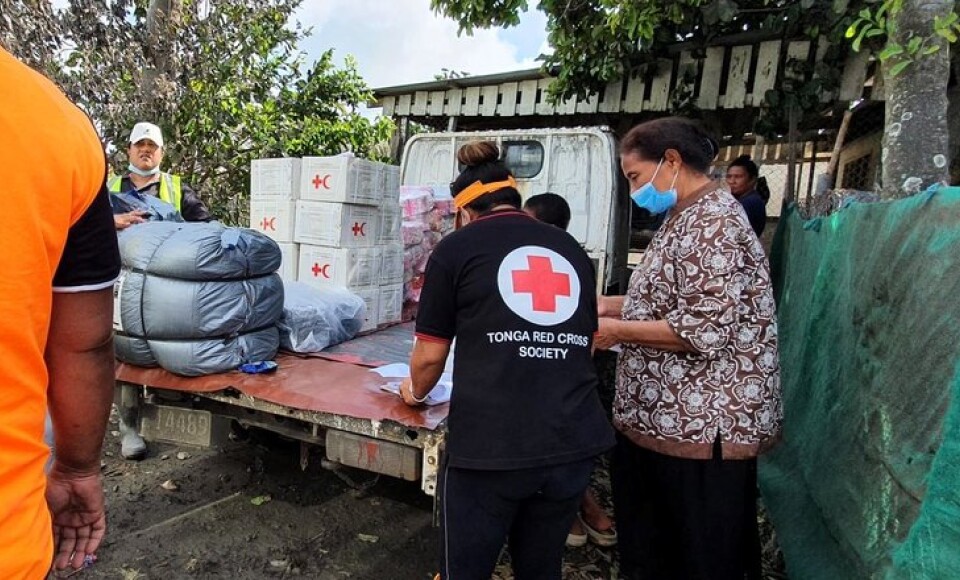 People unloading aid supplies.