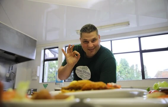 A man smiling at the camera.