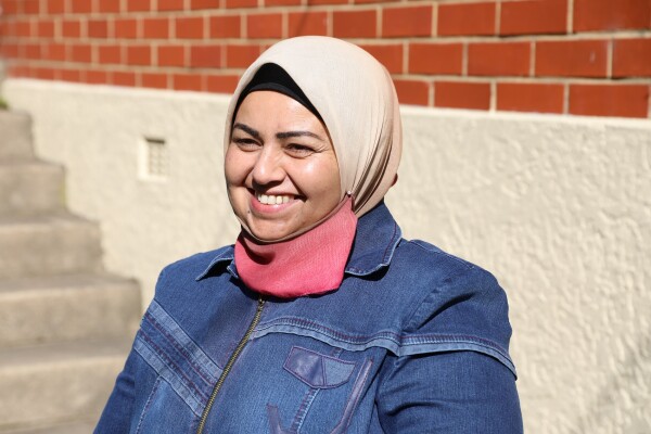 A woman smiling. 