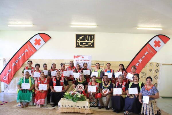 People holding certificates.