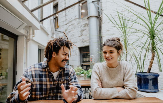 A man and a woman sitting at a table