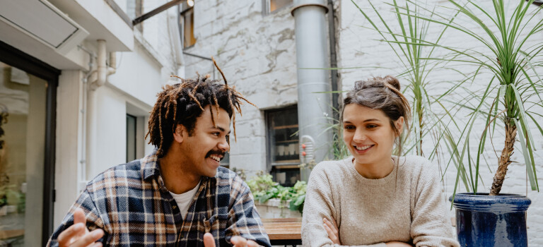 A man and a woman sitting at a table