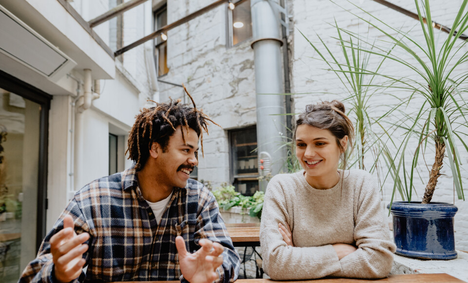 A man and a woman sitting at a table