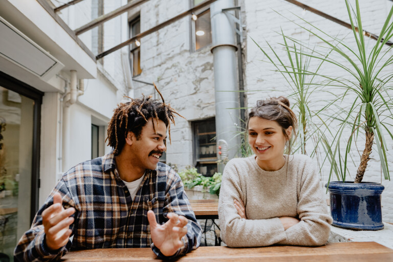 A man and a woman sitting at a table