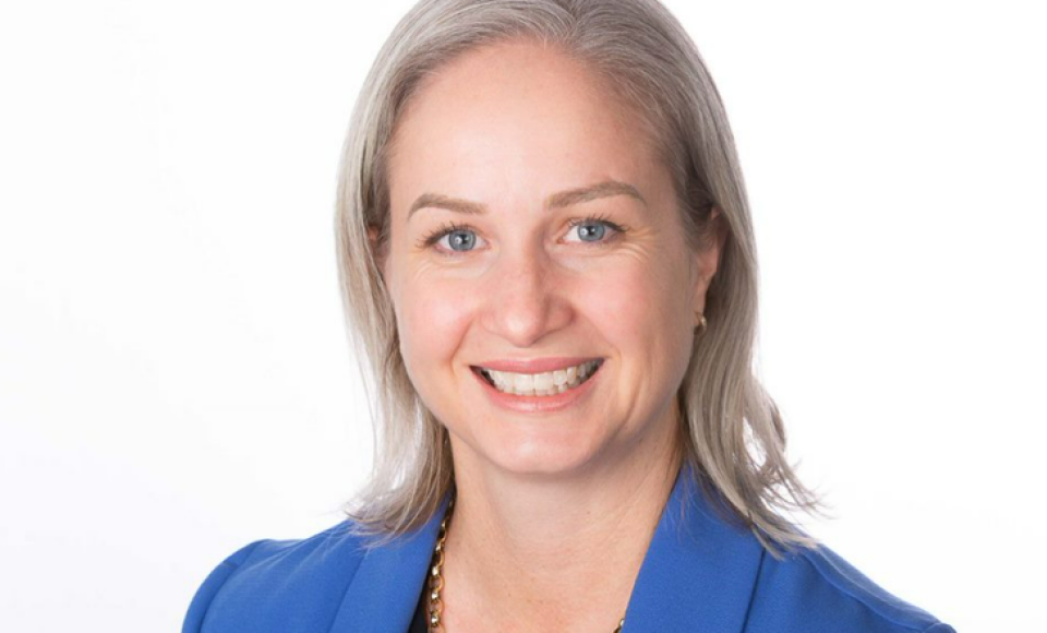 A headshot of a blonde woman.