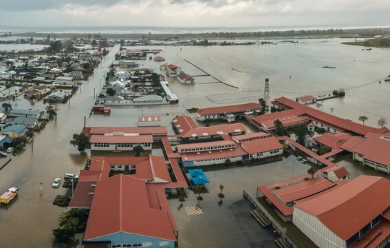 An aerial view of a flooded urban area.