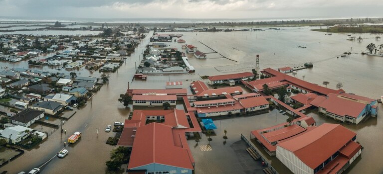 An aerial view of a flooded urban area.