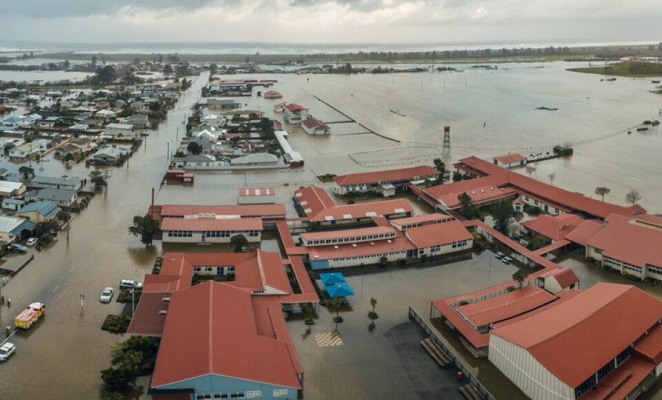 An aerial view of a flooded urban area.