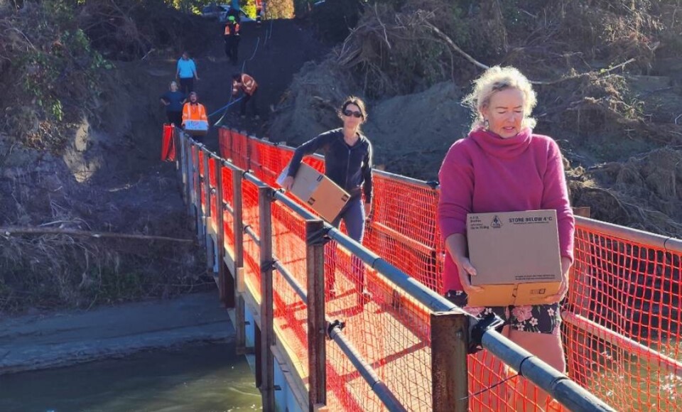 Kindness Collective volunteers carrying supplies to Cyclone Gabrielle affected