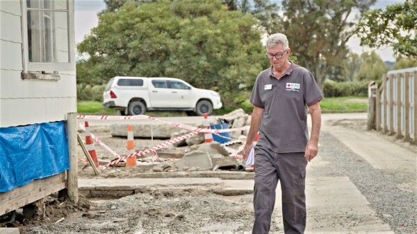 A man walking through a construction site