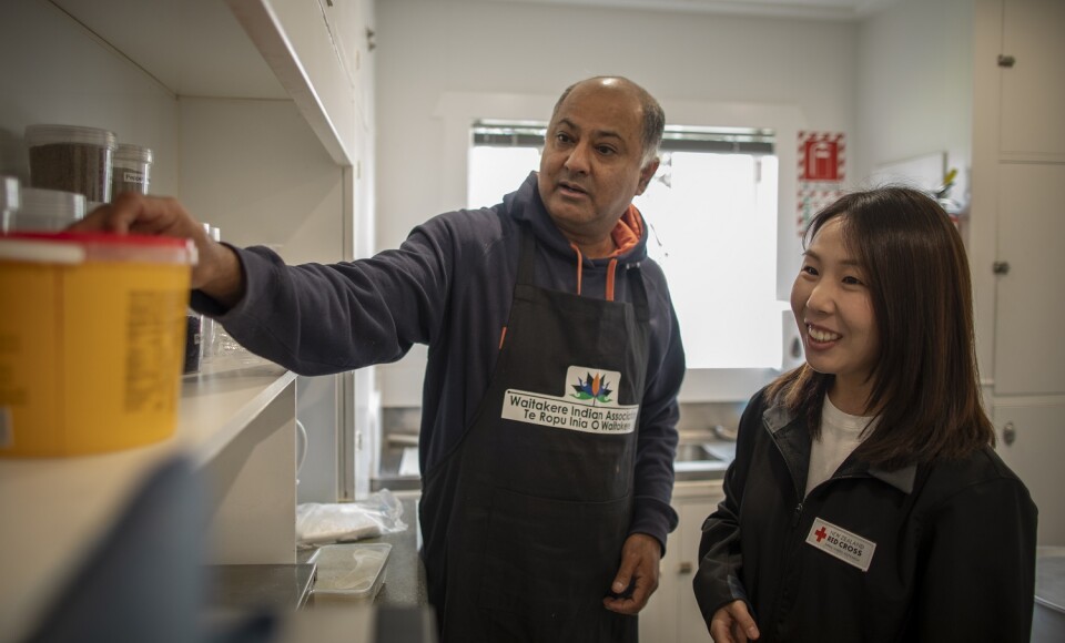 Sunil Kaushal of the Waitakere Indian Association with Red Cross co-ordinator Joan Lee