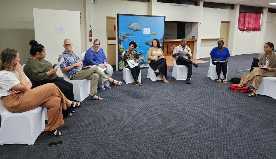 Image of the members of the Pacific Island National Societies in a planning meeting