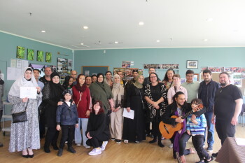 Hosts, visitors, and Red Cross people during the pōwhiri