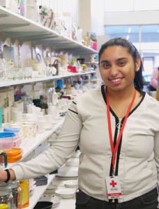 Aarthi Roopesh looks forward to her volunteer shift at the Petone Red Cross store as it gives her the chance to meet and chat to people.