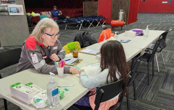 Auckland Disaster Welfare and Support Team member Lilian Moore helping whānau while deployed in Tairāwhiti