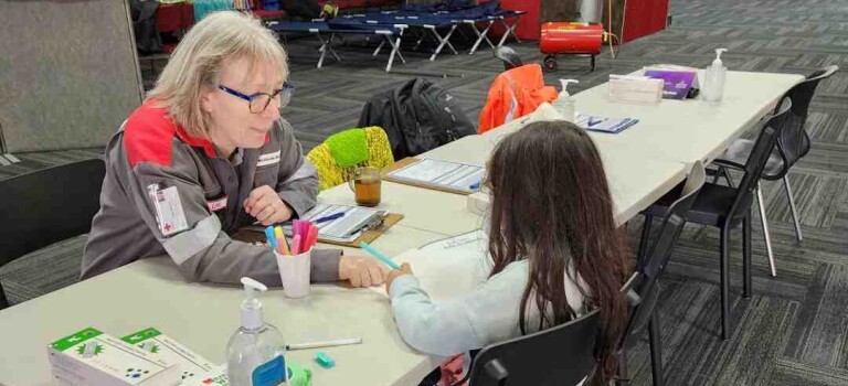 Auckland Disaster Welfare and Support Team member Lilian Moore helping whānau while deployed in Tairāwhiti