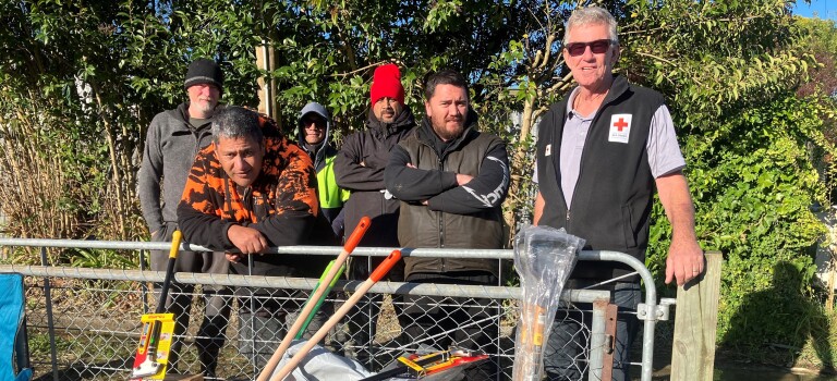 Delivering clean up kits to Te Karaka - Phil Parker on right