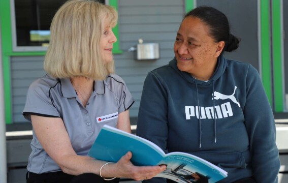 Psychosocial advisor Sarah Gribbin chats with Te Karaka Community Co Lead for Cyclone Recovery Pimia Wehi