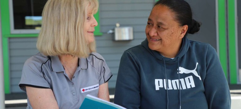 Psychosocial advisor Sarah Gribbin chats with Te Karaka Community Co Lead for Cyclone Recovery Pimia Wehi