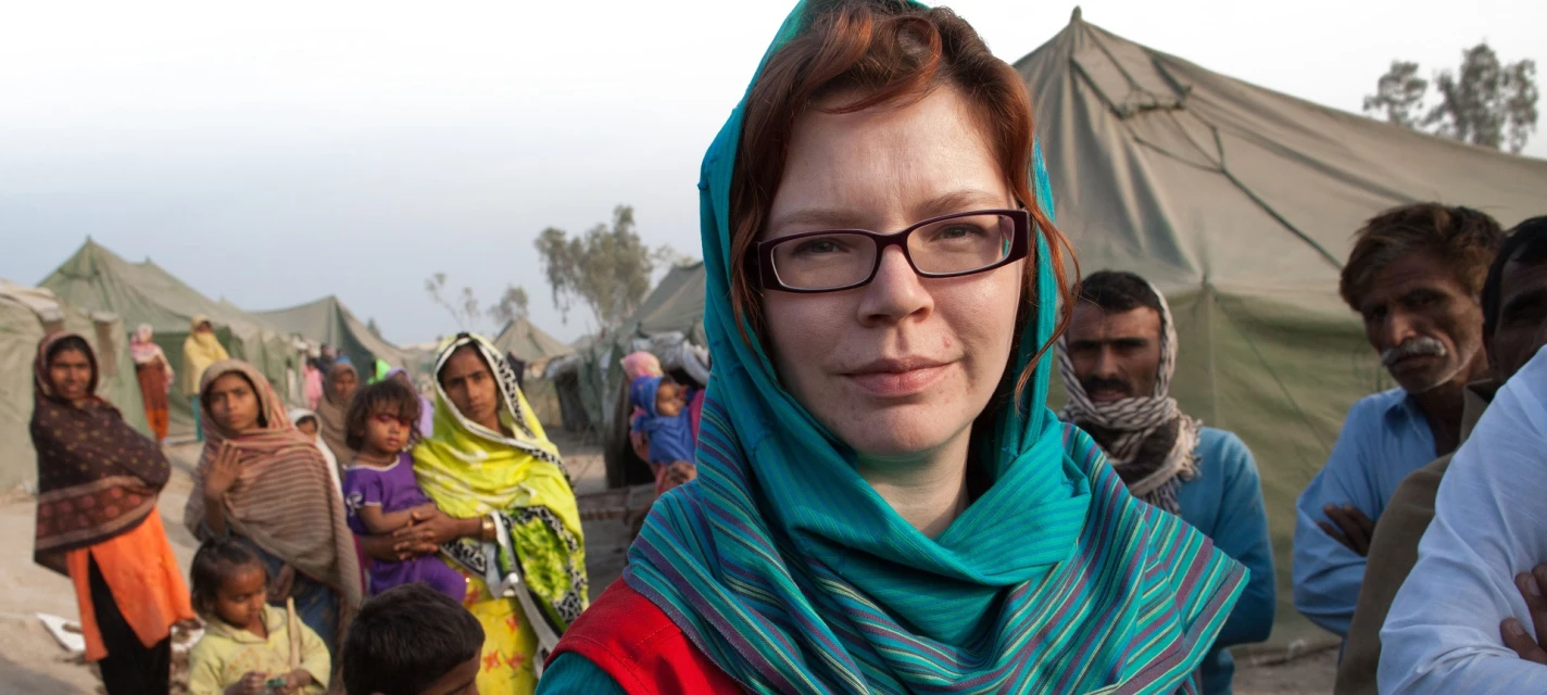 A woman looking into the camera.