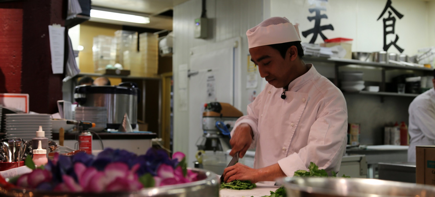 A chef preparing food.