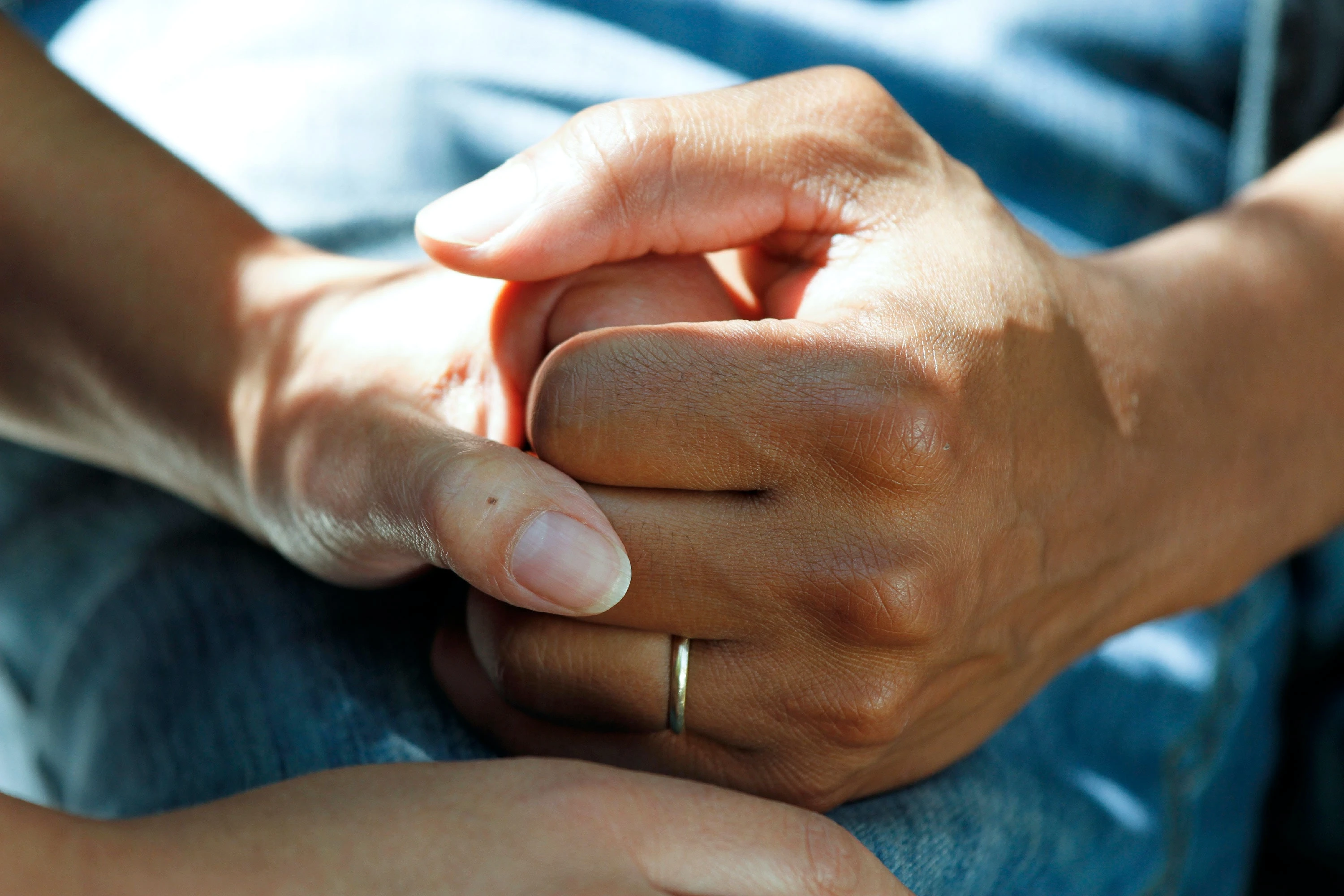 People holding hands.