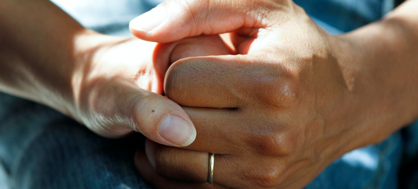 People holding hands.