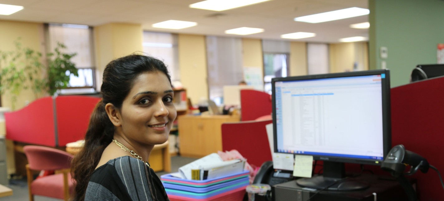 A woman smiling at the camera.
