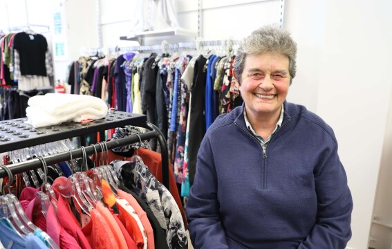 A woman smiling at the camera.