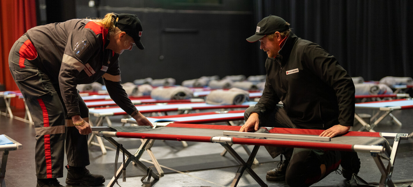 Red Cross volunteers make up stretchers