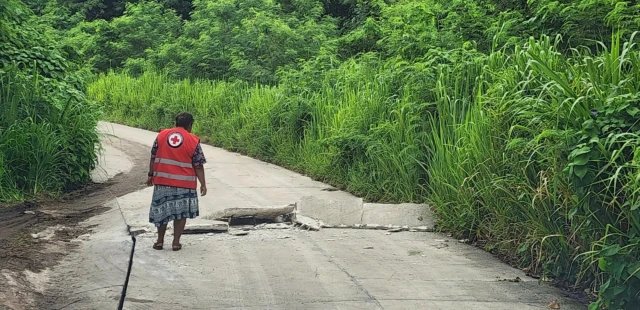 Vanuatu Earthquake  Source VRC Facebook volunteer with cracked road no faces