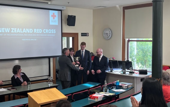 John Dyer presents Victoria University with IHL Moot cup