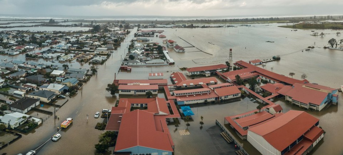 An aerial view of a flooded urban area.