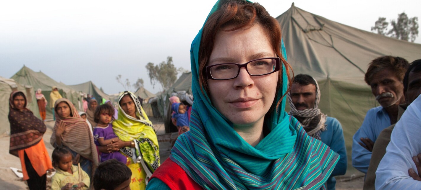 A woman looking into the camera.